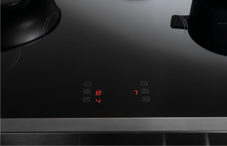 Integrated touch controls on the induction hob
